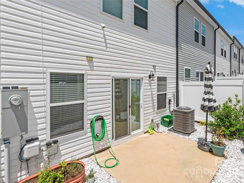 13221 Gadwal Pintail Drive, Charlotte, NC 28262.  MLS# CAR4260236, YatesRealty ID 4248. Back Patio for Taking in Sunshine and Fresh Air