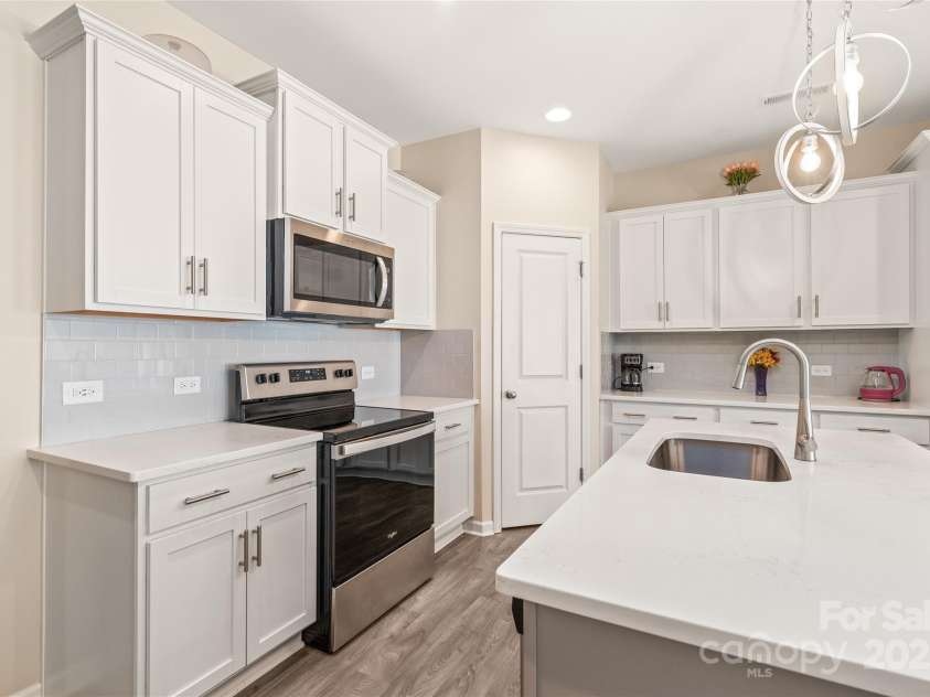 13221 Gadwal Pintail Drive, Charlotte, NC 28262.  MLS# CAR4260236, YatesRealty ID 4248. Kitchen and Pantry