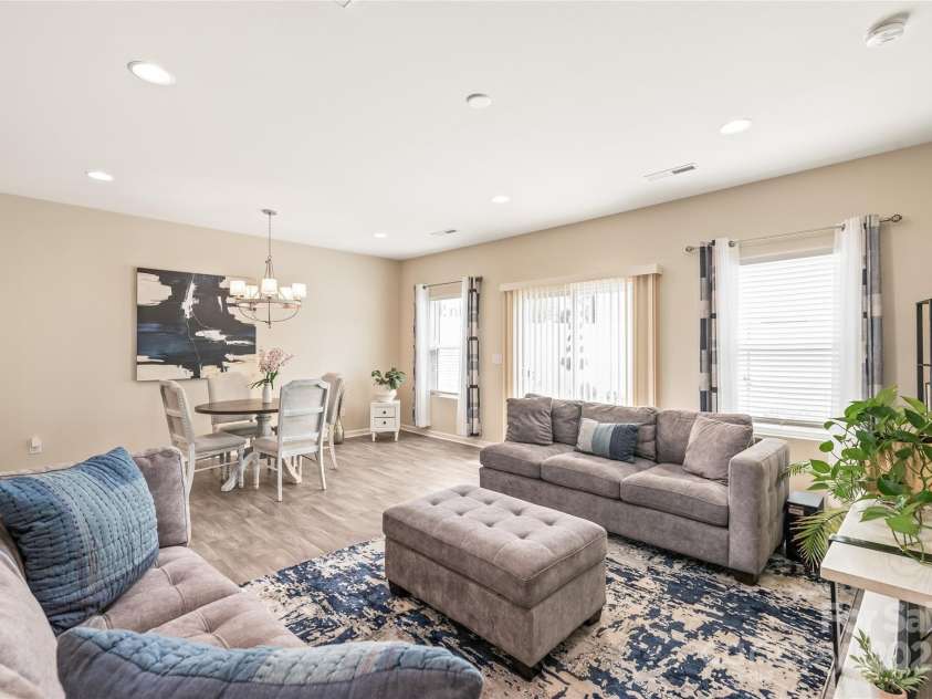 13221 Gadwal Pintail Drive, Charlotte, NC 28262.  MLS# CAR4260236, YatesRealty ID 4248. Living Room and Dining Area