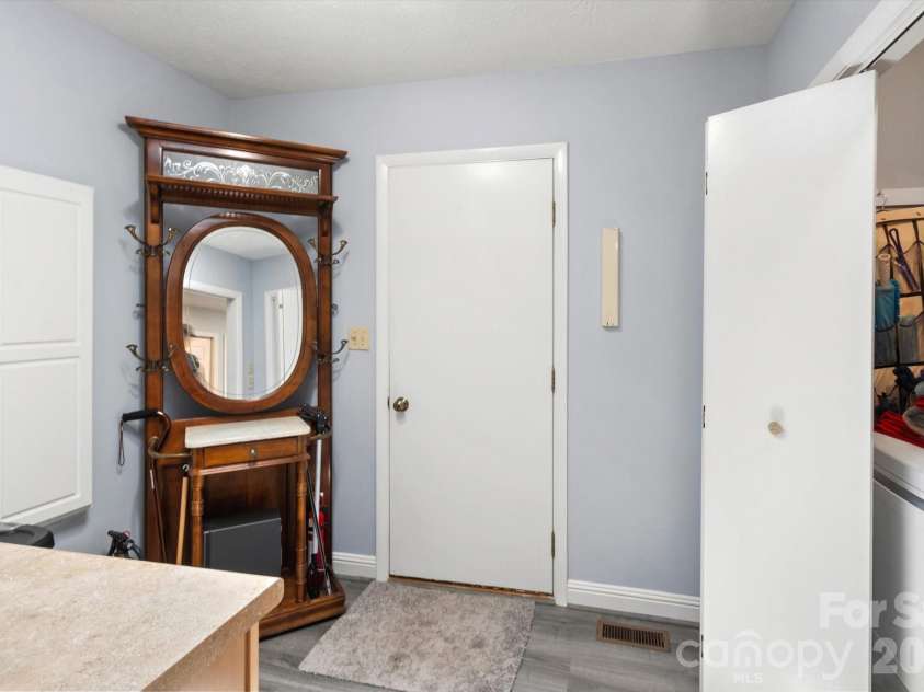 12 Highlander Lane, Hendersonville, NC 28792.  MLS# CAR4400920, YatesRealty ID 42486. Laundry room