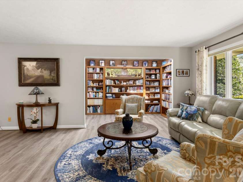 12 Highlander Lane, Hendersonville, NC 28792.  MLS# CAR4400920, YatesRealty ID 42486. Living room with library nook