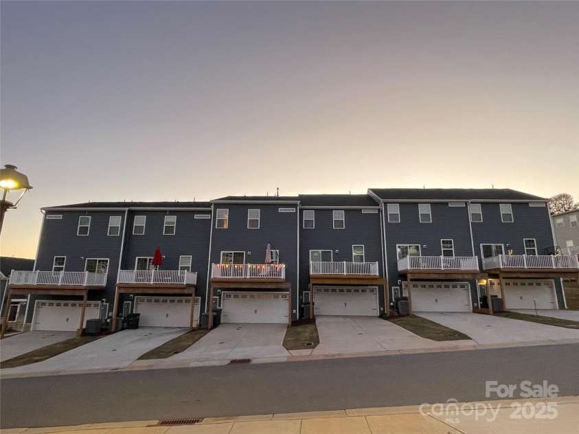 2133 Tupelo Grove Lane, Gastonia, NC 28054.  MLS# CAR4206022, YatesRealty ID 4249. Rear of building. Unit is 3rd from the left.