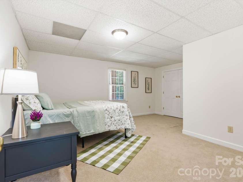 675 Heather Drive, Lincolnton, NC 28092.  MLS# CAR4410217, YatesRealty ID 42494. Lower level bedroom with windows