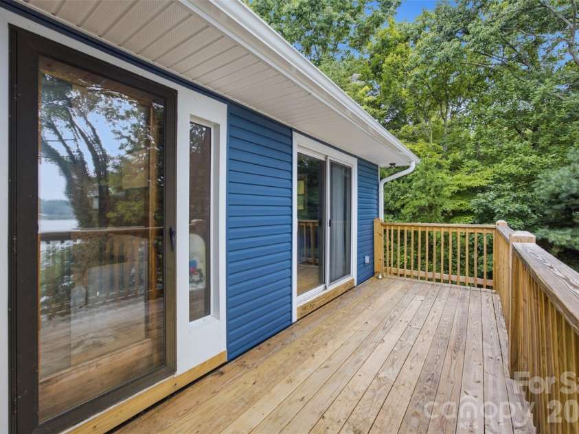 7016 Hyde Street, Sherrills Ford, NC 28673.  MLS# CAR4409956, YatesRealty ID 42495. Back Deck off Primary Bedroom