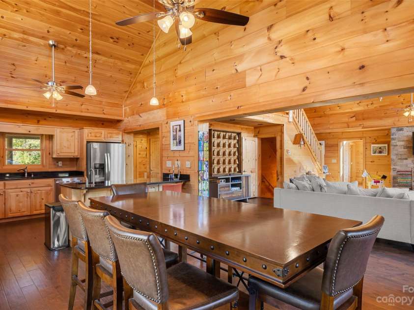 1642 Smith Waldrop Road, Mill Spring, NC 28756.  MLS# CAR4089037, YatesRealty ID 425. Kitchen, Dining, Family Room Open Floor Plan