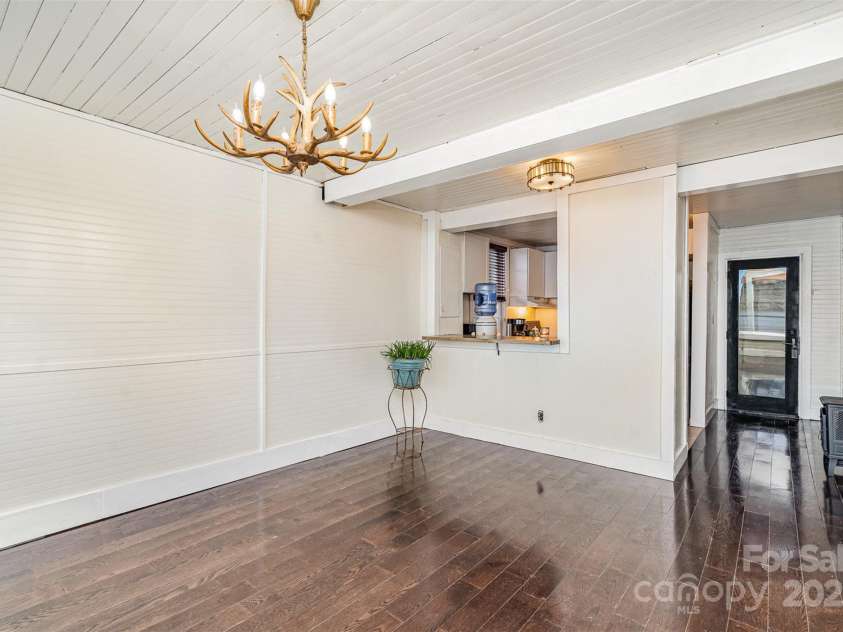 228 Sugar Loaf Drive, Troy, NC 27371.  MLS# CAR4204774, YatesRealty ID 4250. Dining Area toward Kitchen
