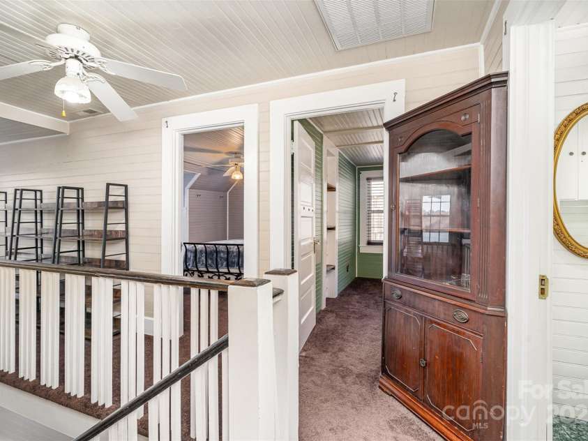 228 Sugar Loaf Drive, Troy, NC 27371.  MLS# CAR4204774, YatesRealty ID 4250. View from top of staircase