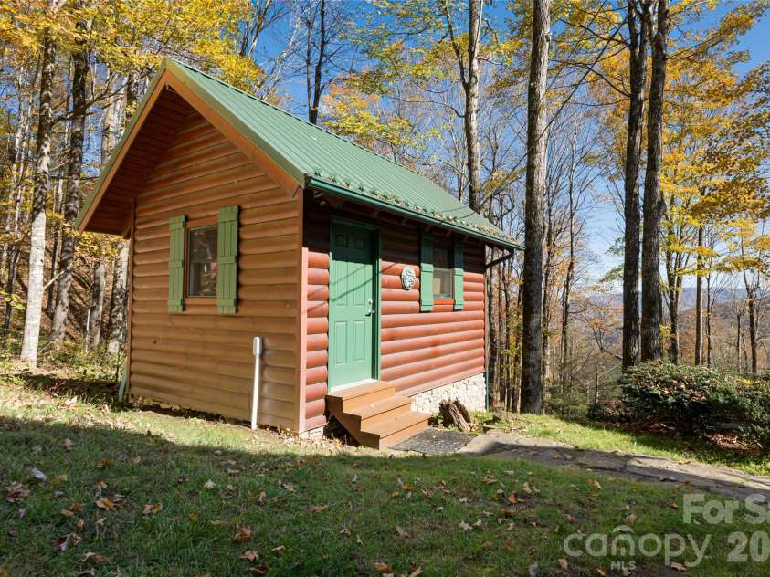 580 Flying Hawk Trail, Waynesville, NC 28786.  MLS# CAR4410856, YatesRealty ID 42522. Dettached heated workshop with crawl space storage