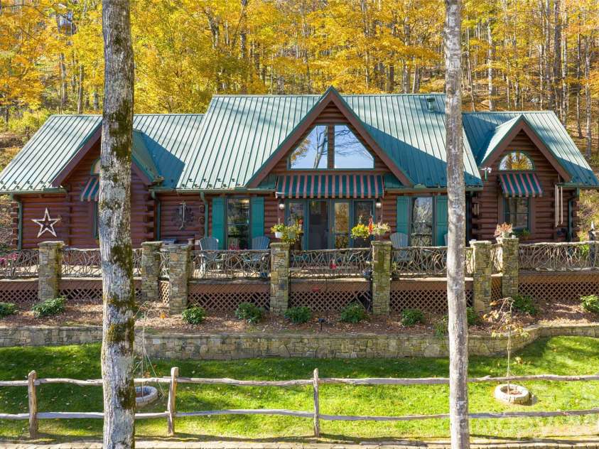 580 Flying Hawk Trail, Waynesville, NC 28786.  MLS# CAR4410856, YatesRealty ID 42522. Fall backdrop