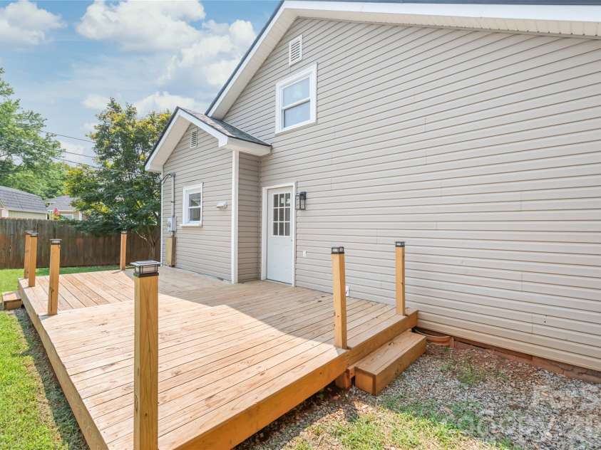 200 Park Avenue, Mount Holly, NC 28120.  MLS# CAR4407165, YatesRealty ID 42529. Back deck great for grilling and entertaining