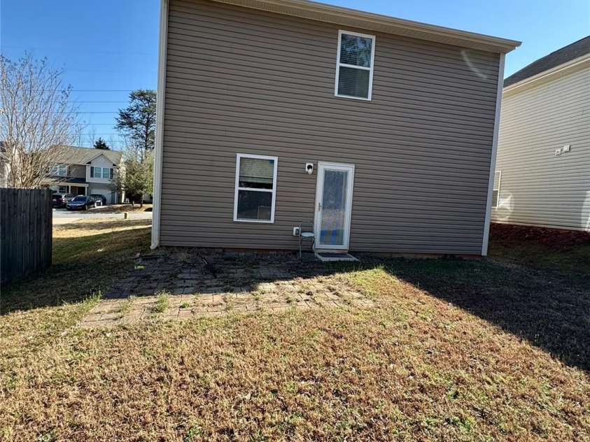 719 Mountain Quail Drive, Charlotte, NC 28216.  MLS# CAR4228004, YatesRealty ID 4253. Rear