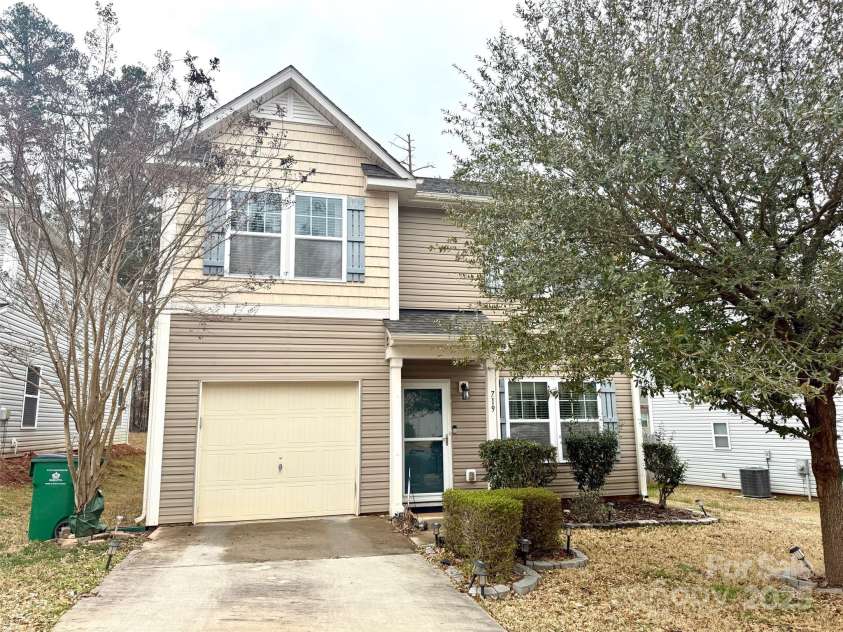 719 Mountain Quail Drive, Charlotte, NC 28216.  MLS# CAR4228004, YatesRealty ID 4253. Side Exterior