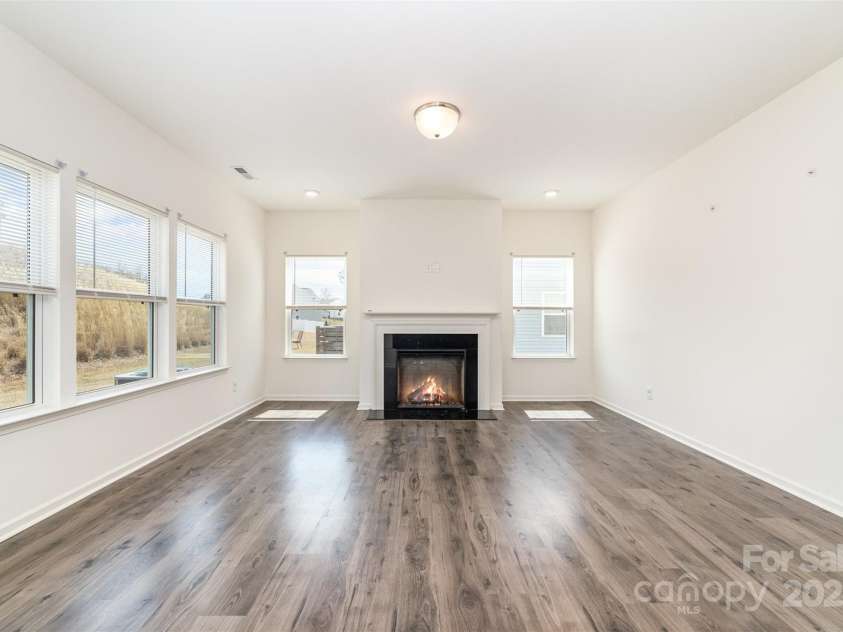 2522 Andes Drive, Statesville, NC 28625.  MLS# CAR4238678, YatesRealty ID 4254. Bright Family Room with Gas Fireplace 5 Windows which lets in an Abundance of Natural Light