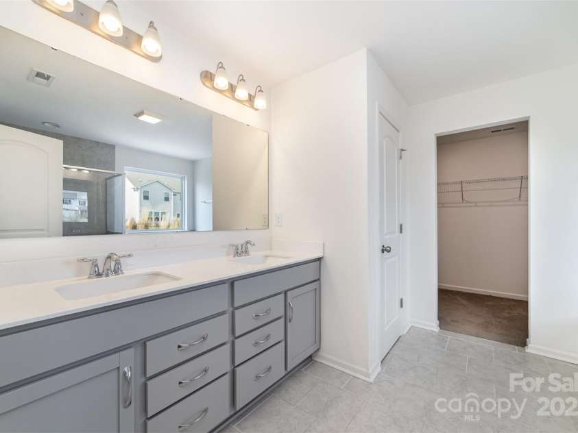 2522 Andes Drive, Statesville, NC 28625.  MLS# CAR4238678, YatesRealty ID 4254. Primary Bathroom with Dual Sinks and Ample Cabinetry