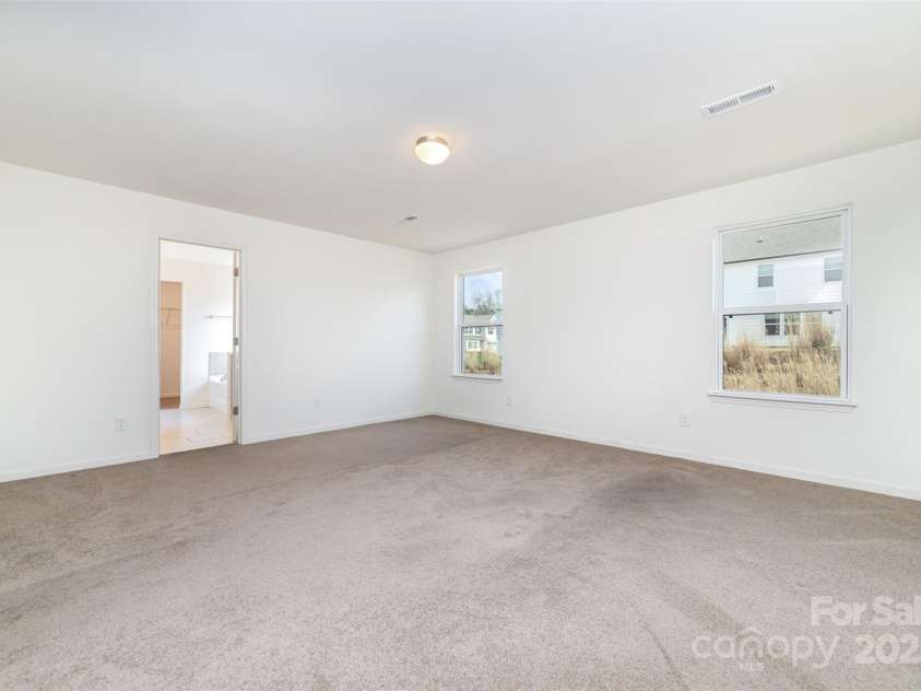 2522 Andes Drive, Statesville, NC 28625.  MLS# CAR4238678, YatesRealty ID 4254. Spacious Primary Bedroom