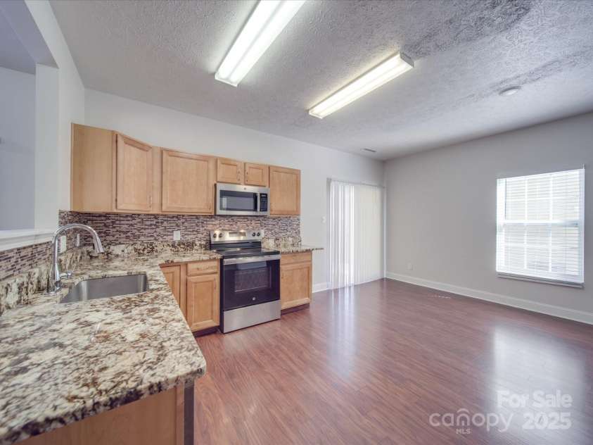 5670 Hammermill Drive, Harrisburg, NC 28075.  MLS# CAR4240141, YatesRealty ID 4255. 