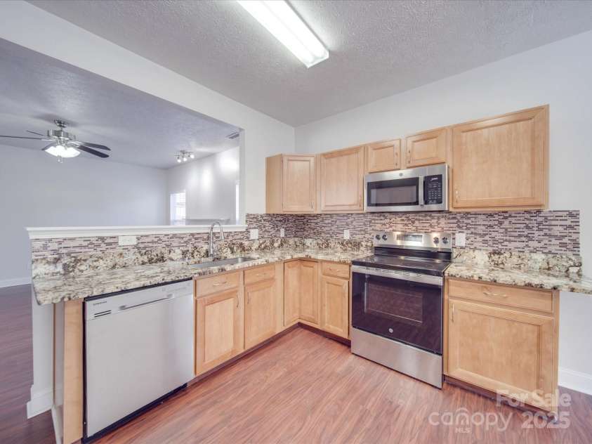 5670 Hammermill Drive, Harrisburg, NC 28075.  MLS# CAR4240141, YatesRealty ID 4255. 