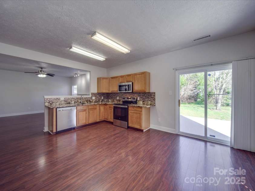 5670 Hammermill Drive, Harrisburg, NC 28075.  MLS# CAR4240141, YatesRealty ID 4255. 