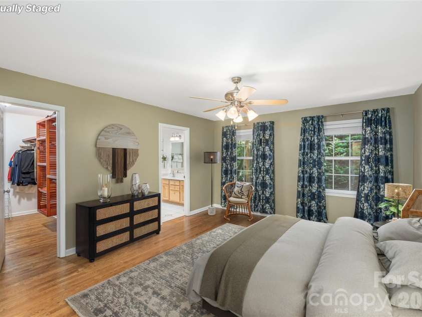 602 Hidden Springs Drive, Asheville, NC 28804.  MLS# CAR4401344, YatesRealty ID 42558. Primary Suite on the Main - virtually staged