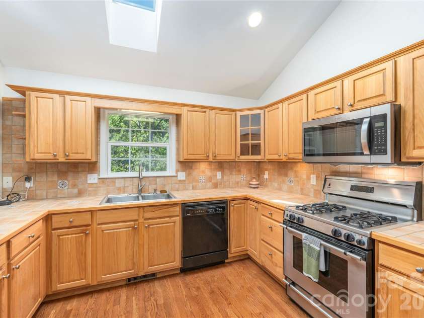 602 Hidden Springs Drive, Asheville, NC 28804.  MLS# CAR4401344, YatesRealty ID 42558. Skylit Kitchen