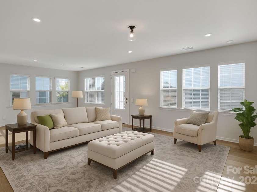 8817 Arrington Hall Drive, Charlotte, NC 28215.  MLS# CAR4312474, YatesRealty ID 42560. Living room virtually staged