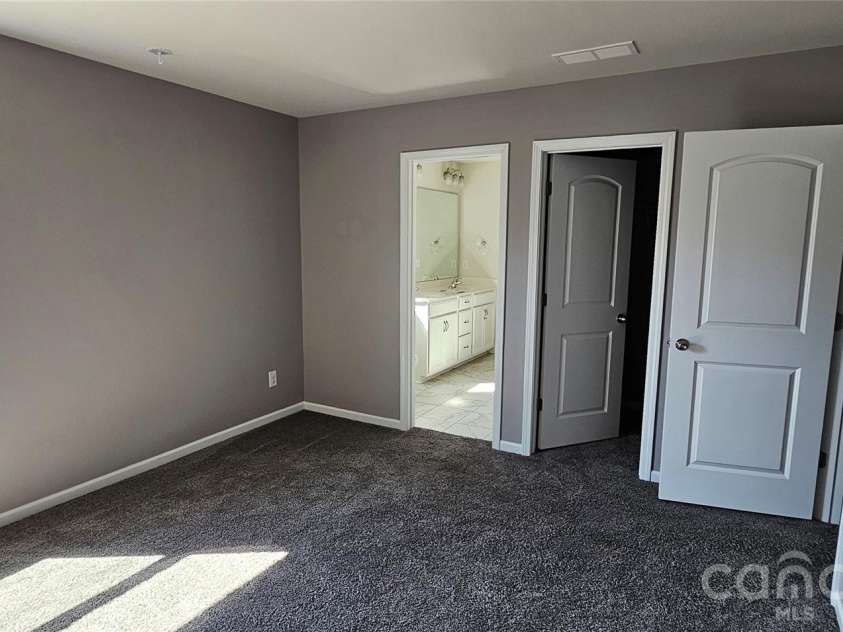 19113 Hawk Haven Lane, Charlotte, NC 28278.  MLS# CAR4358216, YatesRealty ID 4257. Master bedroom