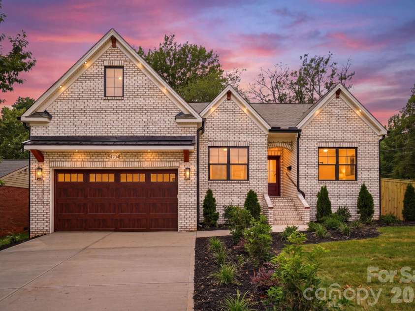 4704 Murrayhill Road, Charlotte, NC 28209.  MLS# CAR4388819, YatesRealty ID 42570. Front view at twilight.