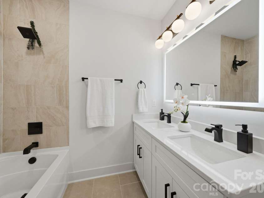 4704 Murrayhill Road, Charlotte, NC 28209.  MLS# CAR4388819, YatesRealty ID 42570. Guest bathroom.