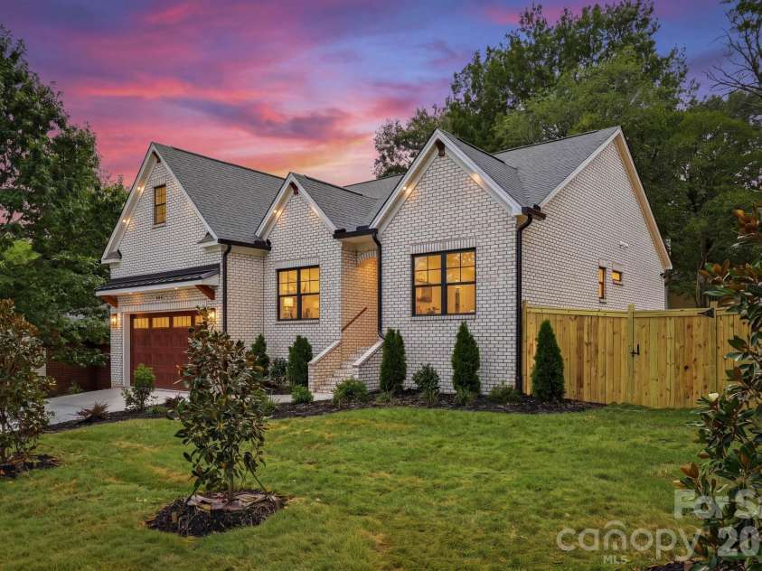 4704 Murrayhill Road, Charlotte, NC 28209.  MLS# CAR4388819, YatesRealty ID 42570. Side view at twilight.