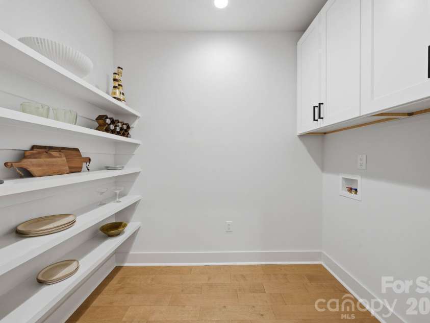 4704 Murrayhill Road, Charlotte, NC 28209.  MLS# CAR4388819, YatesRealty ID 42570. Walk-pantry / laundry area.