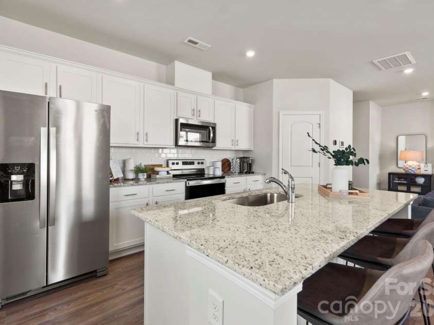 8059 Midas Lane, Locust, NC 28097.  MLS# CAR4404231, YatesRealty ID 42571. Photo is representative