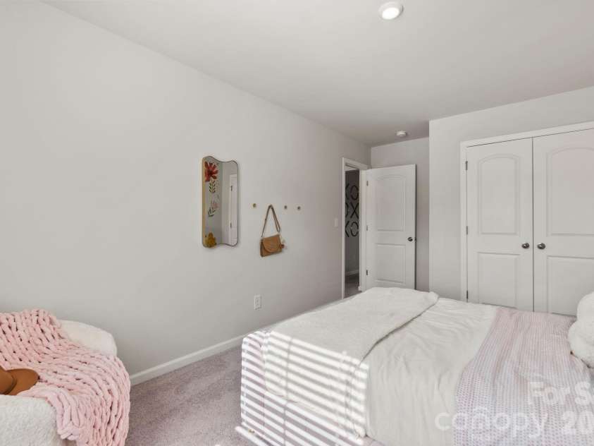 8059 Midas Lane, Locust, NC 28097.  MLS# CAR4404231, YatesRealty ID 42571. Photo is representative