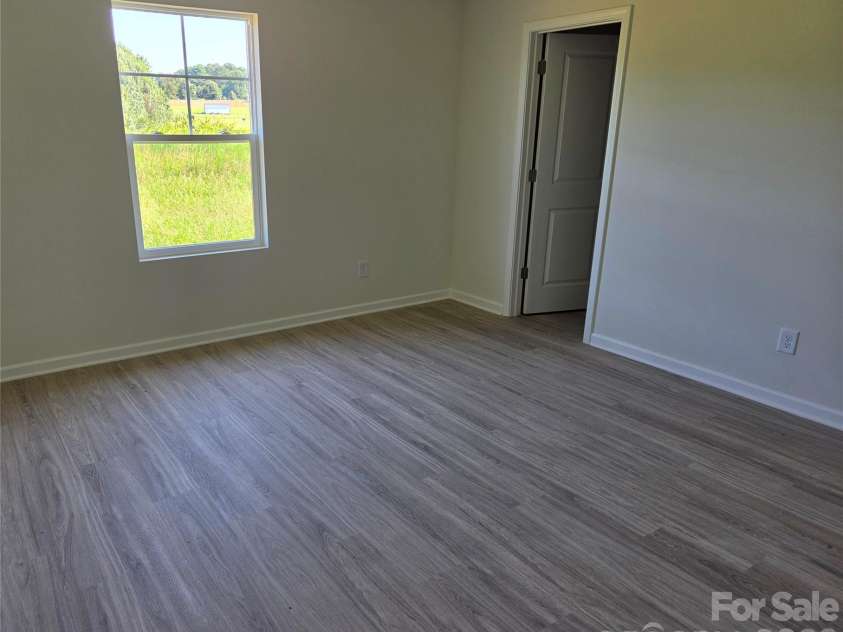 128 Sanders Way, Statesville, NC 28625.  MLS# CAR4404168, YatesRealty ID 42576. Bedroom
