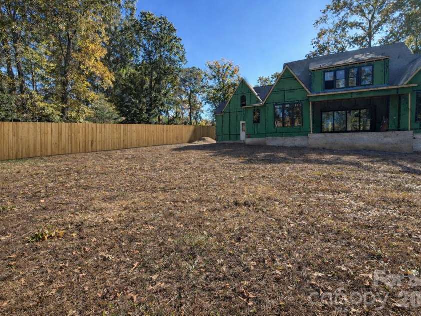 125 Randstone Court, Charlotte, NC 28211.  MLS# CAR4329471, YatesRealty ID 4258. Privacy Fence Included- Some Images Amy include virtual enhancements to illustrate potential features. 