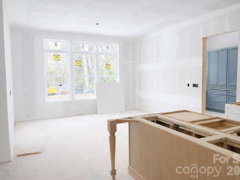 125 Randstone Court, Charlotte, NC 28211.  MLS# CAR4329471, YatesRealty ID 4258. View from Family room into Dining area/Scullery