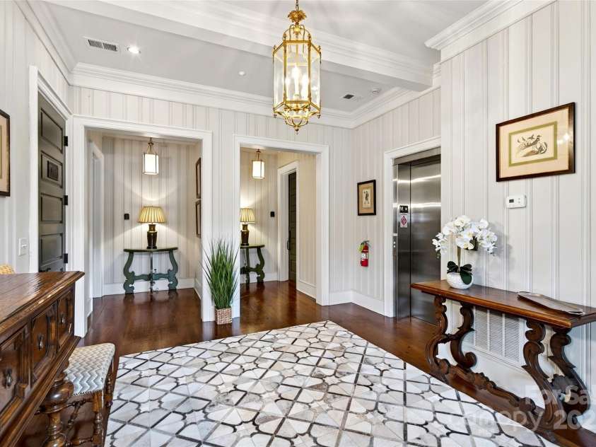 305 Clubhouse Lane, Mill Spring, NC 28756.  MLS# CAR4311469, YatesRealty ID 4258. Main common area, take the elevator to the lower level