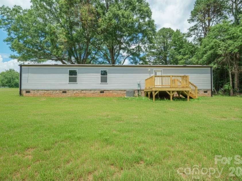 5101 Flay Road, Lincolnton, NC 28092.  MLS# CAR4386812, YatesRealty ID 42581. Grass virtually enhanced; Back of Home
