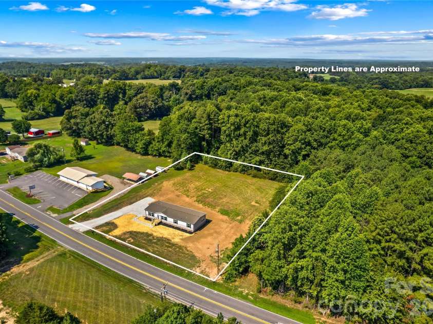 1080 Memorial Highway, Harmony, NC 28634.  MLS# CAR4404711, YatesRealty ID 42593. 