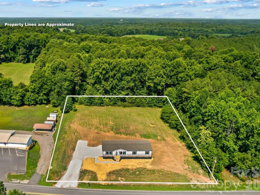 1080 Memorial Highway, Harmony, NC 28634.  MLS# CAR4404711, YatesRealty ID 42593. 