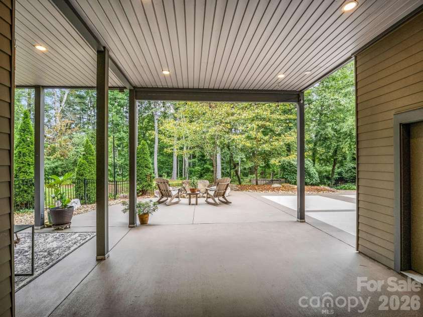 55 Pheasant Branch Court, Hendersonville, NC 28739.  MLS# CAR4406624, YatesRealty ID 42595. Back yard.