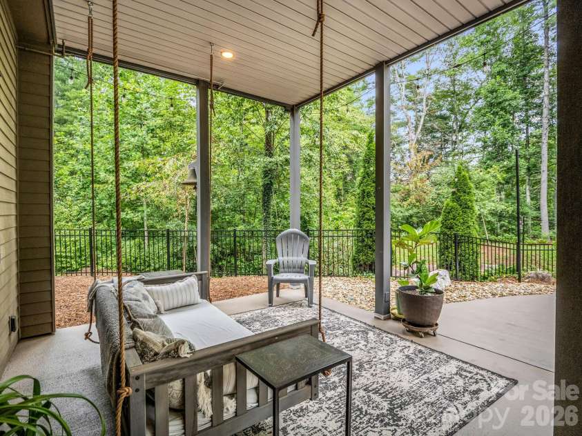 55 Pheasant Branch Court, Hendersonville, NC 28739.  MLS# CAR4406624, YatesRealty ID 42595. Back yard.