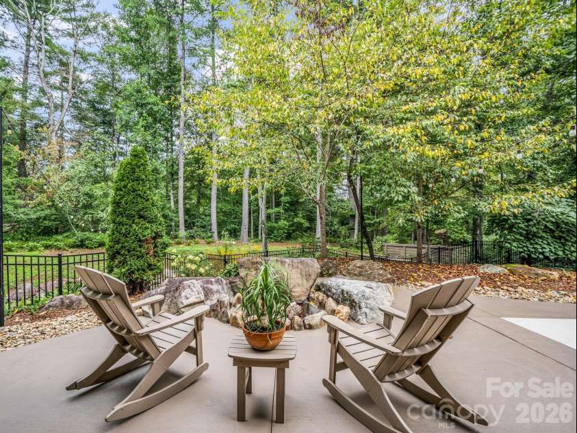 55 Pheasant Branch Court, Hendersonville, NC 28739.  MLS# CAR4406624, YatesRealty ID 42595. Firepit area in back yard.
