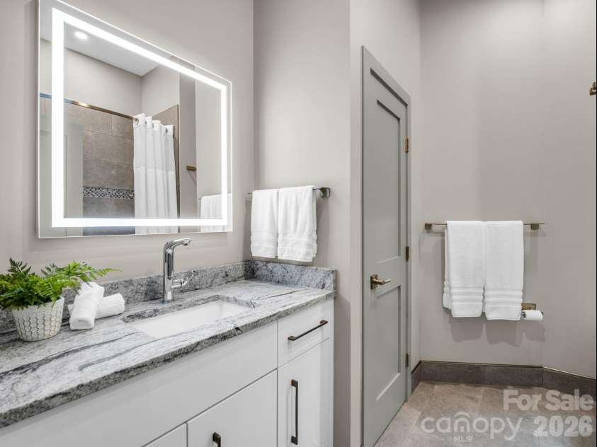 55 Pheasant Branch Court, Hendersonville, NC 28739.  MLS# CAR4406624, YatesRealty ID 42595. Full bathroom on lower level.