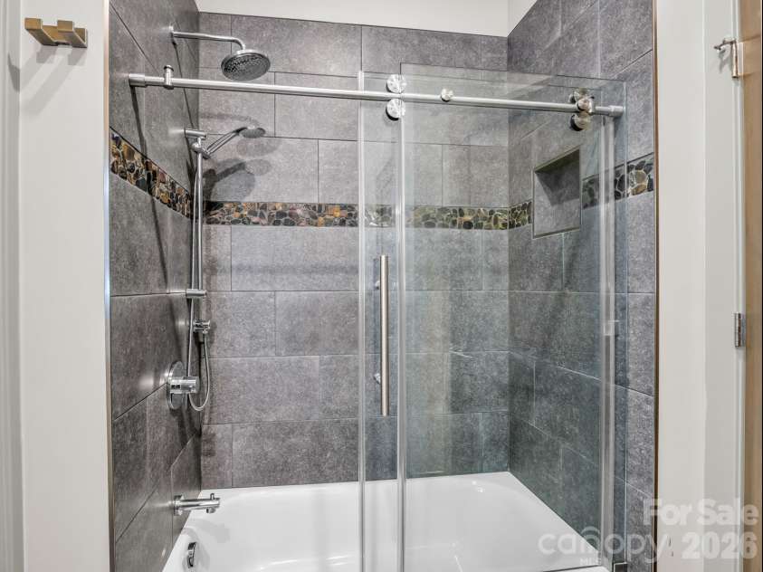 55 Pheasant Branch Court, Hendersonville, NC 28739.  MLS# CAR4406624, YatesRealty ID 42595. Second full bathroom on main level.
