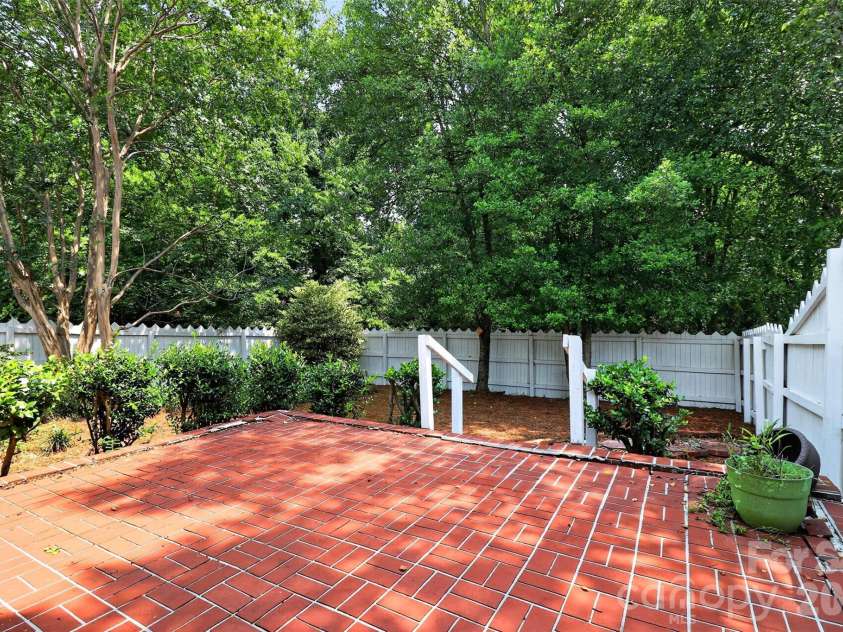10316 Johns Towne Drive, Charlotte, NC 28210.  MLS# CAR4378149, YatesRealty ID 42598. Brick paver patio