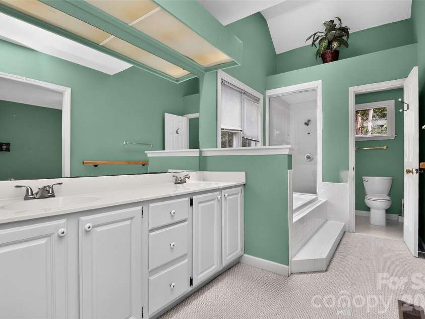 10316 Johns Towne Drive, Charlotte, NC 28210.  MLS# CAR4378149, YatesRealty ID 42598. Dual sinks in primary bathroom
