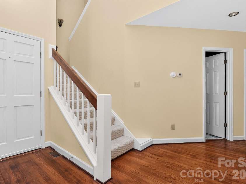 10316 Johns Towne Drive, Charlotte, NC 28210.  MLS# CAR4378149, YatesRealty ID 42598. Staircase to 2nd floor