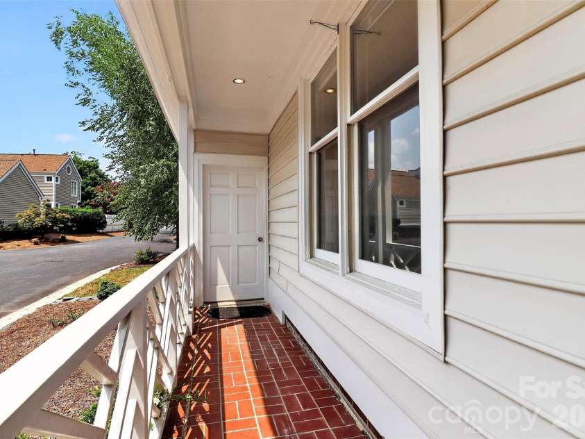 10316 Johns Towne Drive, Charlotte, NC 28210.  MLS# CAR4378149, YatesRealty ID 42598. Walkway to garage