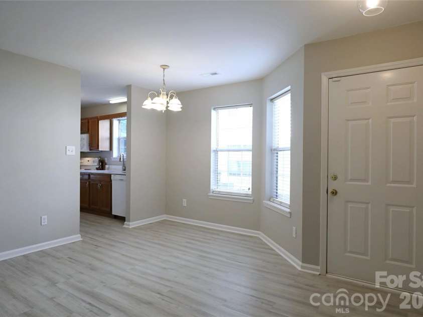 5909 Amity Springs Drive, Charlotte, NC 28212.  MLS# CAR4409733, YatesRealty ID 42616. Eating area leading to kitchen