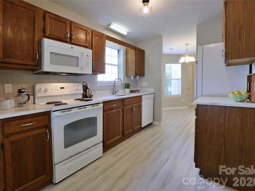 5909 Amity Springs Drive, Charlotte, NC 28212.  MLS# CAR4409733, YatesRealty ID 42616. Microwave and refrigerator recently updated.